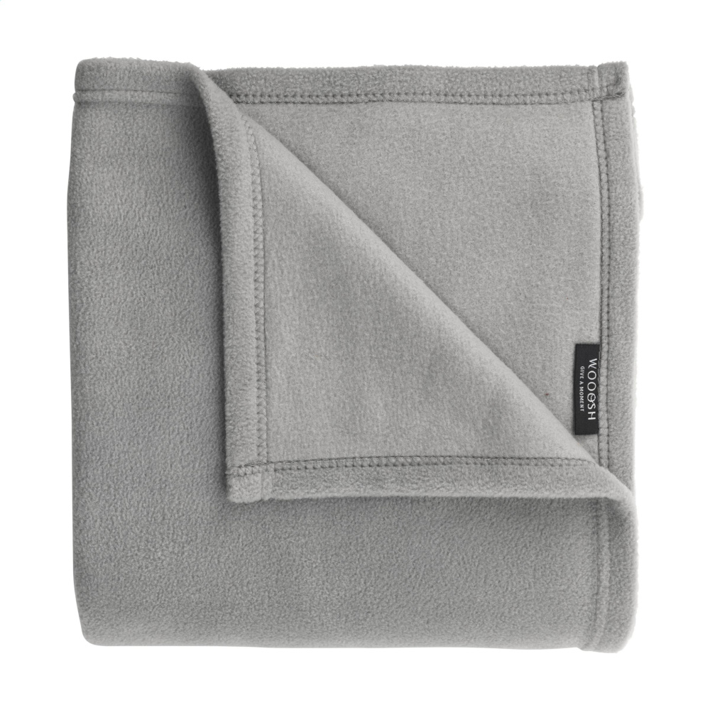 Logo trade firmakingituse pilt: Wooosh Vida GRS taaskasutatud materjalist pleed